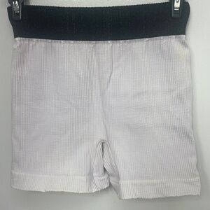 FREE PEOPLE MOVEMENT SEAMLESS
SHORT, light Pink (faded) black waistband XS/S